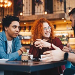 Group of friends hanging out at cafe