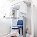 Cone beam scanner against wall in dental office